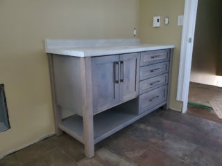 Grey vanity with Mont Blanc laminate countertop