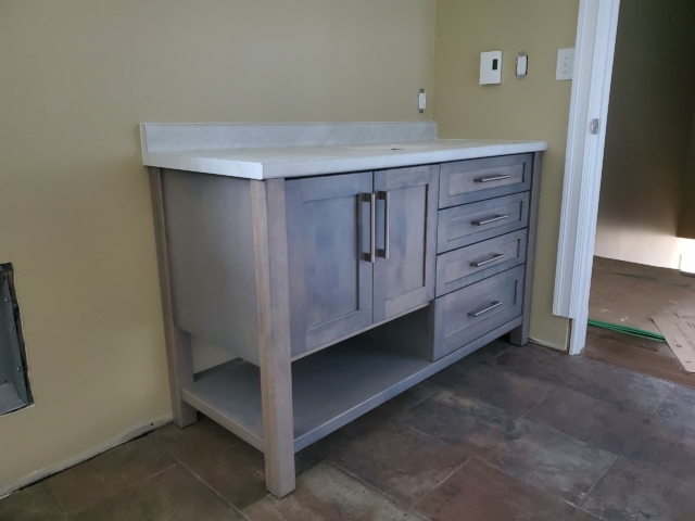 Grey Vanity with Mont Blanc Countertop Grey vanity with Mont Blanc laminate countertop